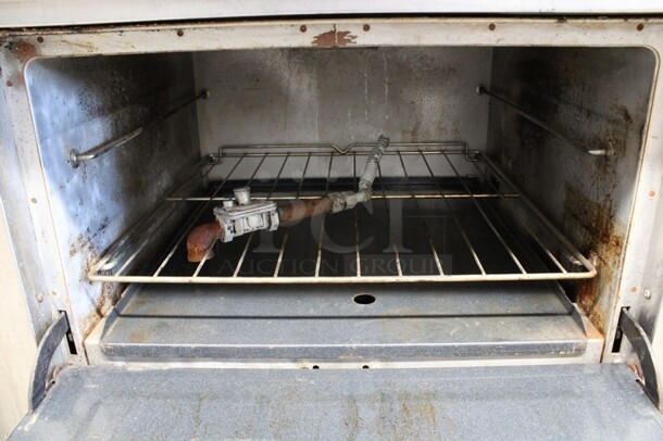 Southbend Model X436D-3G Stainless Steel Commercial Natural Gas Powered Flat Top Griddle w/ Oven and Backsplash on Commercial Casters. 36x34x60 - Image 3 of 6