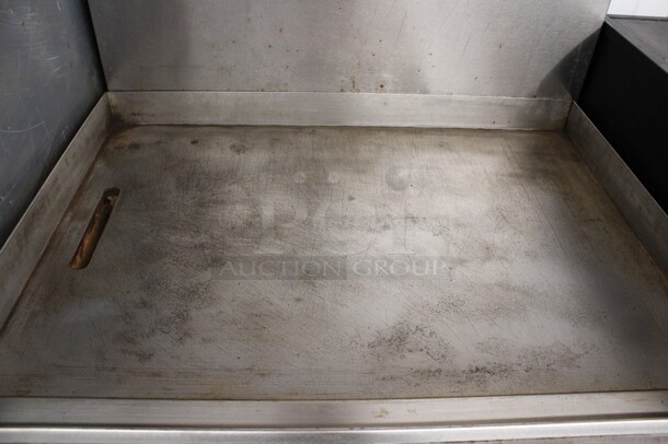 Southbend Model X436D-3G Stainless Steel Commercial Natural Gas Powered Flat Top Griddle w/ Oven and Backsplash on Commercial Casters. 36x34x60 - Image 5 of 6