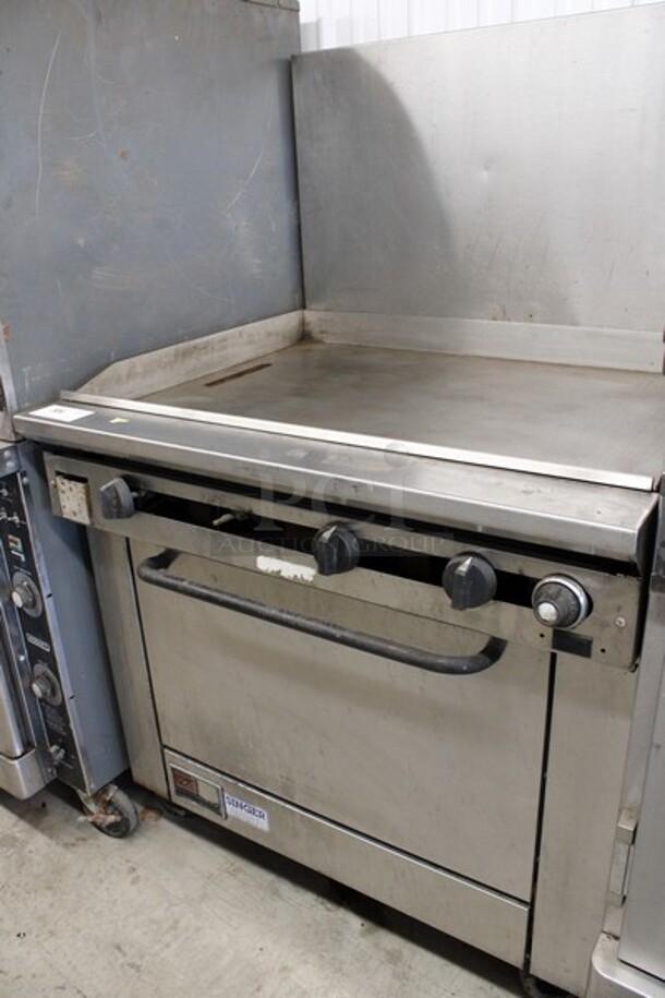 Southbend Model X436D-3G Stainless Steel Commercial Natural Gas Powered Flat Top Griddle w/ Oven and Backsplash on Commercial Casters. 36x34x60 - Image 6 of 6
