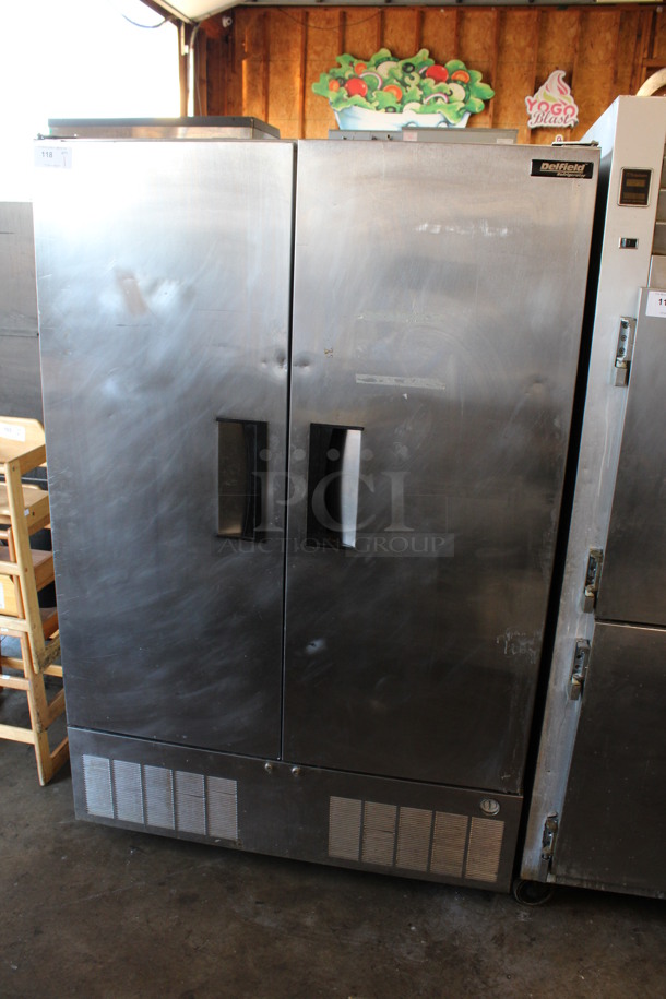 Delfield Stainless Steel Commercial 2 Door Reach In Cooler w/ Poly Coated Racks on Commercial Casters. 50.5x34x79. Tested and Powers On But Does Not Get Cold - Image 3 of 6