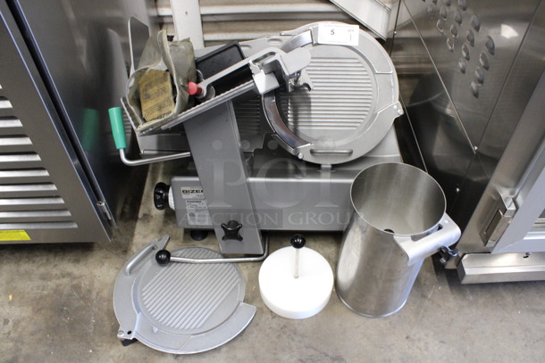 2016 Bizerba Stainless Steel Commercial Countertop Meat Slicer w/ Blade Sharpener, Vegetable Chute, Extra Pusher and Extra Blade Cover. 120 Volts, 1 Phase. 29x24x26. Tested and Working!