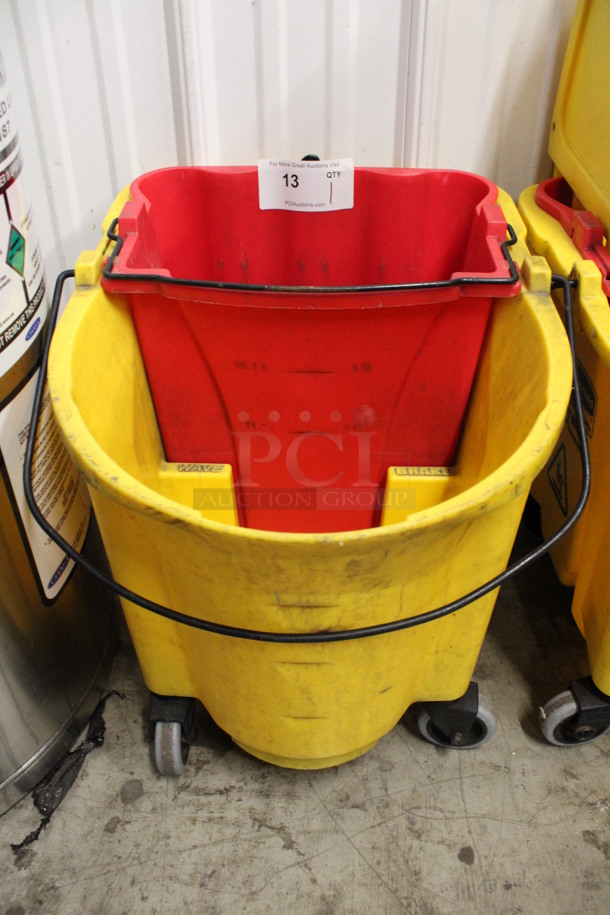 Yellow and Red Poly Mop Bucket on Commercial Casters. 16x21x18