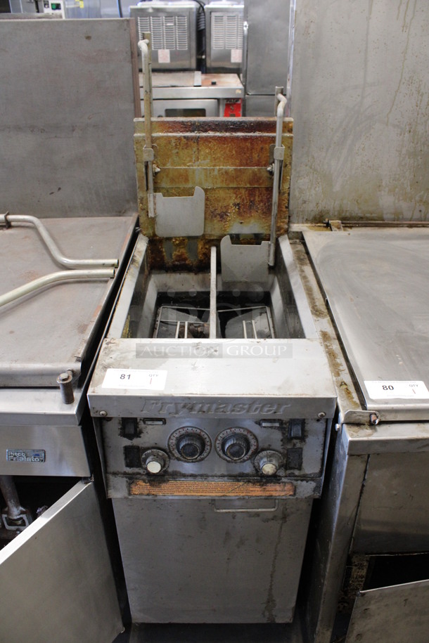 Frymaster Model MJ1472EBLSD Stainless Steel Commercial Floor Style Natural Gas Powered Deep Fat Fryer on Commercial Casters. 63,500 BTU. 15.5x34x56
