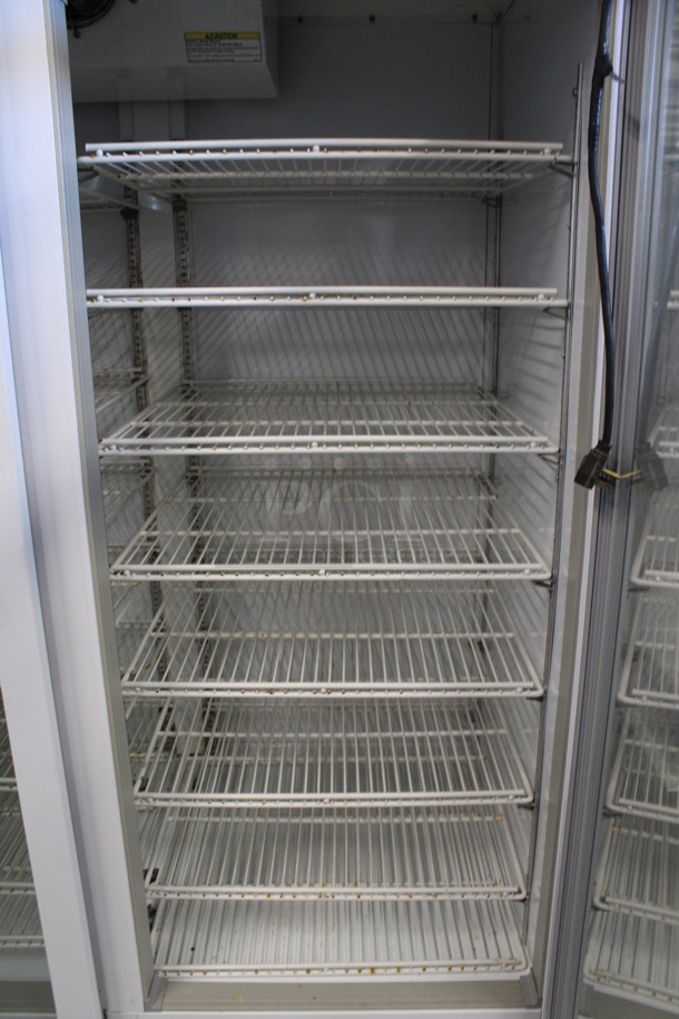 Beverage Air Model CRG74-1 Metal Commercial 3 Door Reach In Cooler Merchandiser w/ Poly Coated Racks. 115 Volts, 1 Phase. 78x32x79.5. Tested and Working! - Image 3 of 6