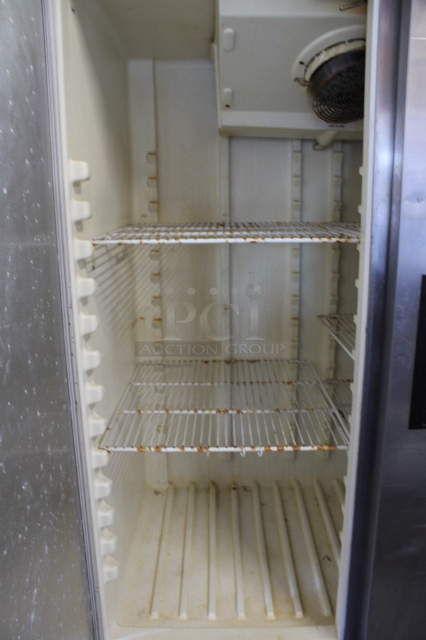 Delfield Stainless Steel Commercial 2 Door Reach In Cooler w/ Poly Coated Racks on Commercial Casters. 50.5x34x79. Tested and Powers On But Does Not Get Cold - Image 4 of 6
