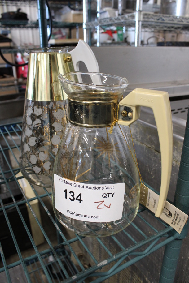 2 Various Glass Pitchers. 6x5x8.5, 6x7x9.5. 2 Times Your Bid! - Image 1 of 2