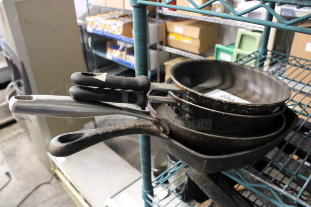 4 Various Metal Skillets. Includes 15x8.5x2. 4 Times Your Bid!