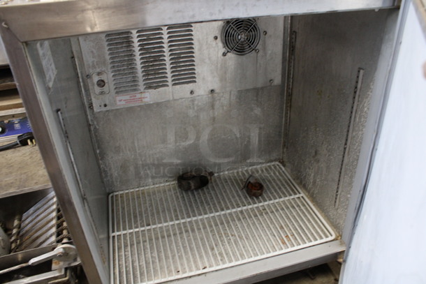 Silver King Model SKUCF7F Stainless Steel Commercial Single Door Undercounter Freezer on Commercial Casters. 1 Caster Needs To Be Reattached. 115 Volts, 1 Phase. 27x28x32. Tested and Temps at 34 Degrees! - Image 3 of 5