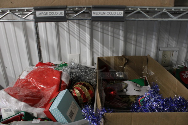 ALL ONE MONEY! Shelf Lot of Various Christmas Items and Decorations Including Tissue Paper and Garland! Some Items Are Brand New. Does Not Include Shelving Unit. - Image 5 of 6