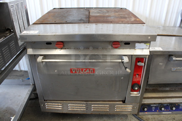 Vulcan Stainless Steel Commercial Natural Gas Powered Flat Top Griddle w/ Oven on Commercial Casters. 34x39x36 - Image 1 of 7