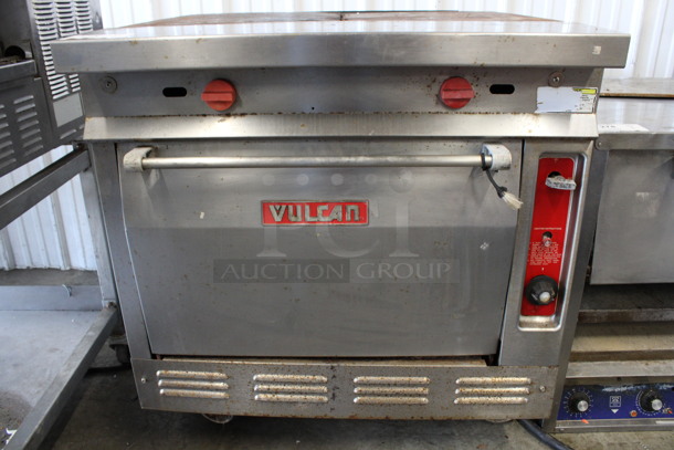 Vulcan Stainless Steel Commercial Natural Gas Powered Flat Top Griddle w/ Oven on Commercial Casters. 34x39x36 - Image 2 of 7