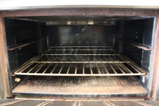 Vulcan Stainless Steel Commercial Natural Gas Powered Flat Top Griddle w/ Oven on Commercial Casters. 34x39x36 - Image 5 of 7