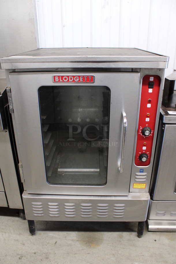 Blodgett Stainless Steel Commercial Electric Powered Half Size Convection Oven w/ View Through Door and Thermostatic Controls. 120 Volts, 1 Phase. 30x34x45