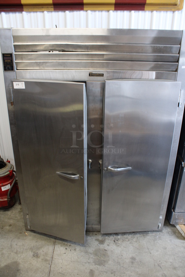 Traulsen Model RHT 2-32 WUT Stainless Steel Commercial 2 Door Reach In Cooler. 115 Volts, 1 Phase. 58x34x77. Cannot Test - Unit Was Previously Hardwired