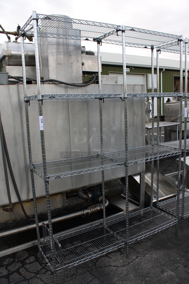 Chrome Finish 4 Tier Shelving Unit w/ 6 Poles. BUYER MUST DISMANTLE. PCI CANNOT DISMANTLE FOR SHIPPING. PLEASE CONSIDER FREIGHT CHARGES. 60x18x86. Each Metro Is 30" Wide. - Image 1 of 4