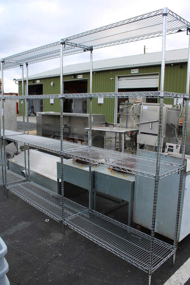 Chrome Finish 4 Tier Shelving Unit w/ 6 Poles. BUYER MUST DISMANTLE. PCI CANNOT DISMANTLE FOR SHIPPING. PLEASE CONSIDER FREIGHT CHARGES. 108x18x86. Metros Are 60" and 48" Wide. - Image 1 of 5