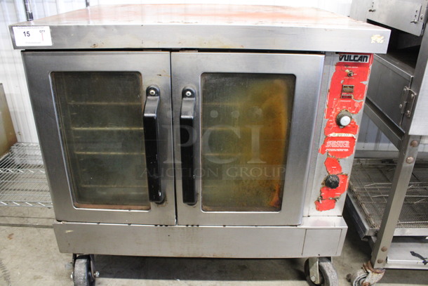 Vulcan Stainless Steel Commercial Natural Gas Powered Full Size Convection Oven w/ View Through Doors, Metal Oven Racks and Thermostatic Controls on Commercial Casters. 40.5x36x39