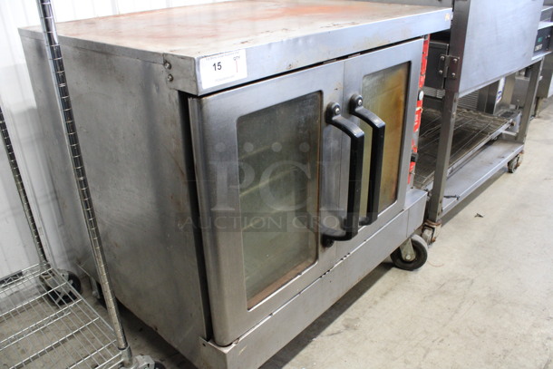 Vulcan Stainless Steel Commercial Natural Gas Powered Full Size Convection Oven w/ View Through Doors, Metal Oven Racks and Thermostatic Controls on Commercial Casters. 40.5x36x39 - Image 6 of 6