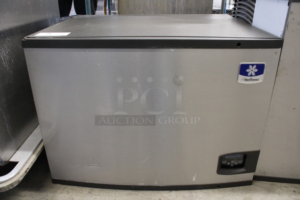 2011 Manitowoc Model IY0694N-261 Stainless Steel Commercial Ice Machine Head w/ Manitowoc Model JC0495 Remote Fan. 208-230 Volts, 1 Phase. 30x25x21.5