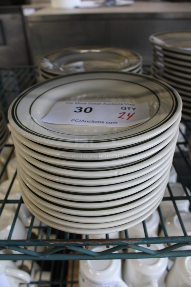 24 White Ceramic Plates w/ Green Lines on Rim. 6.75x6.75x1. 24 Times Your Bid!