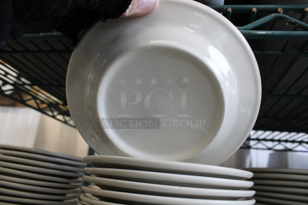 24 White Ceramic Plates w/ Green Lines on Rim. 6.75x6.75x1. 24 Times Your Bid! - Image 2 of 3