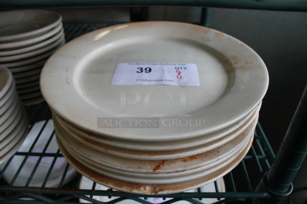 8 White Ceramic Plates. 10.25x10.25x1. 8 Times Your Bid!