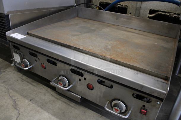 Vulcan Stainless Steel Commercial Countertop Natural Gas Powered Flat Top Griddle w/ Thermostatic Controls and Gas Hose. 36x32x15.5 - Image 4 of 6