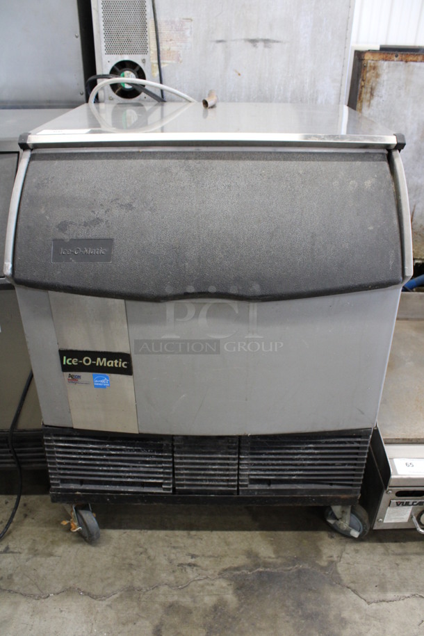 Ice O Matic Model ICEU300FA3 Stainless Steel Commercial Air Cooled Self Contained Undercounter Ice Machine on Commercial Casters. 115 Volts, 1 Phase. 30x29x40