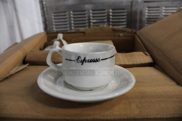 32 BRAND NEW IN BOX! White Ceramic Espresso Mugs w/ 38 White Ceramic Saucers. 3x2.5x2, 4.5x4.5x0.5. 32 Times Your Bid!