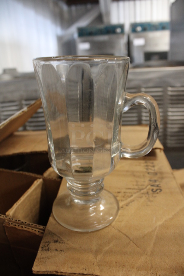 15 BRAND NEW IN BOX! Glass Footed Mugs. 4x3x6. 15 Times Your Bid!