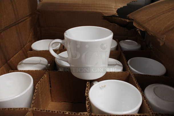 29 BRAND NEW IN BOX! White Ceramic Mugs. 4x3x3. 29 Times Your Bid!