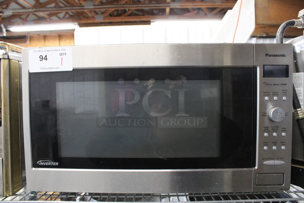 Panasonic Chrome Finish Countertop Microwave Oven w/ Plate. 24x18x13.5 - Image 1 of 5