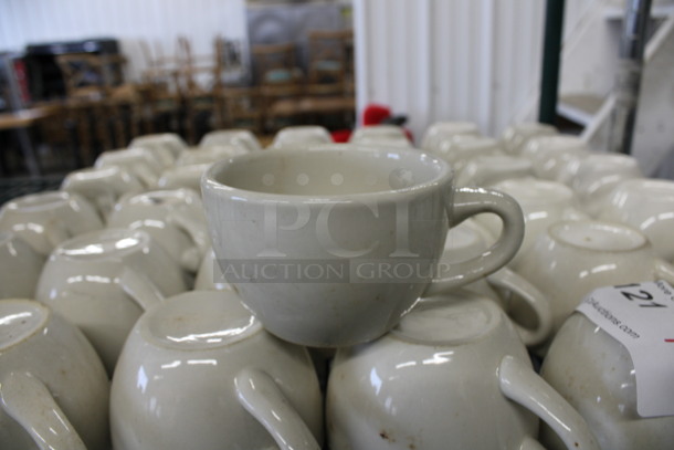 19 White Ceramic Mugs. 5x4x2.5. 19 Times Your Bid!