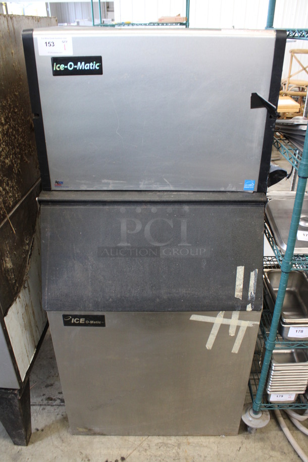 Ice O Matic Model ICE0500HT7 Stainless Steel Commercial Air Cooled Ice Machine Head on Ice O Matic Model B55PSA Commercial Ice Bin. 115 Volts, 1 Phase. 30x32x64.5