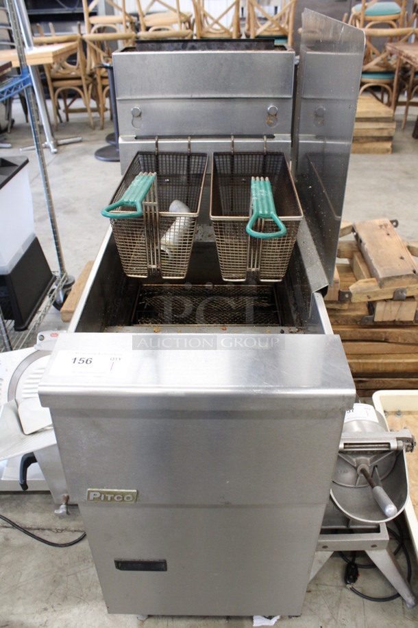 Pitco Frialator Model SG14-S Stainless Steel Commercial Natural Gas Powered Deep Fat Fryer w/ Side Splash Guard and 2 Metal Fry Baskets. 110,000 BTU. 15.5x34x48 - Image 1 of 6