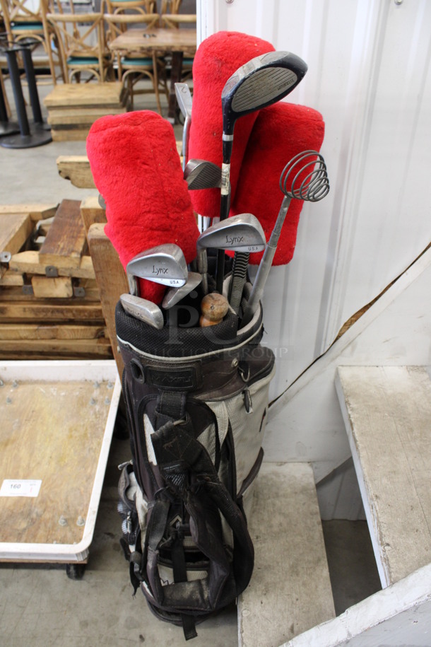 ALL ONE MONEY! Lot of Golf Clubs in Golf Bag w/ 3 Socks and Various Golf Balls. 2, 3, 4, 5, 6, 7 and P Putter. 2, 3, 4 Clubs. Bag: 12x10x35 - Image 1 of 10