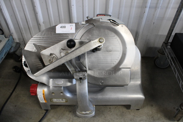 Berkel Model 909M Stainless Steel Commercial Countertop Meat Slicer w/ Blade Sharpener. 115 Volts, 1 Phase. 26x20x21. Tested and Working!