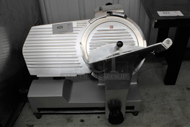 Stainless Steel Commercial Countertop Meat Slicer w/ Blade Sharpener. 24x20x18. Tested and Working!