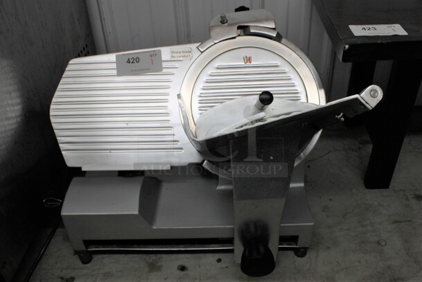 Stainless Steel Commercial Countertop Meat Slicer w/ Blade Sharpener. 24x20x18. Tested and Working! - Image 1 of 7