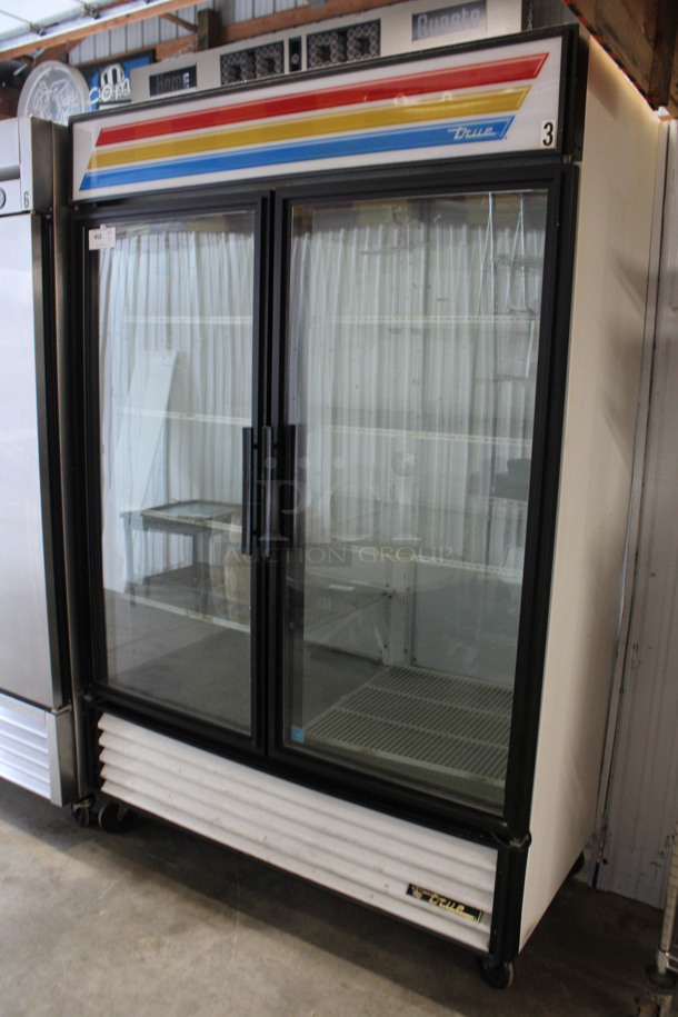 2014 True Model GDM-49-LD ENERGY STAR Metal Commercial 2 Door Reach In Cooler Merchandiser w/ Poly Coated Racks on Commercial Casters. 115 Volts, 1 Phase. 54x30x84. Tested and Working! - Image 2 of 6