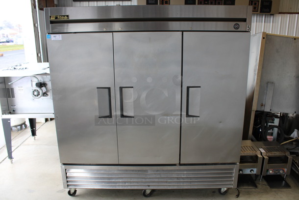 2014 True Model T-72F ENERGY STAR Stainless Steel Commercial 3 Door Reach In Freezer w/ Poly Coated Racks on Commercial Casters. 115 Volts, 1 Phase. 78x30x83.5. Tested and Working!
