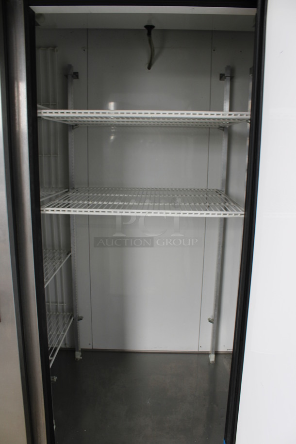 2014 True Model T-72F ENERGY STAR Stainless Steel Commercial 3 Door Reach In Freezer w/ Poly Coated Racks on Commercial Casters. 115 Volts, 1 Phase. 78x30x83.5. Tested and Working! - Image 5 of 8