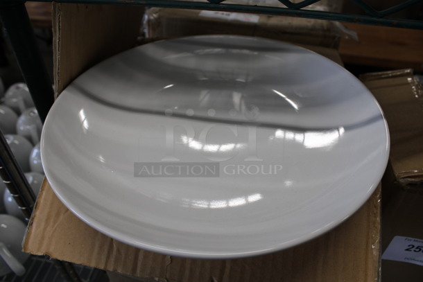 12 BRAND NEW IN BOX! Core White Ceramic Plates. 12.25x12.25x1.5. 12 Times Your Bid!