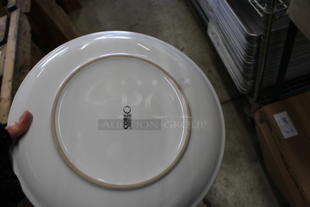 12 BRAND NEW IN BOX! Core White Ceramic Plates. 12.25x12.25x1.5. 12 Times Your Bid! - Image 3 of 4