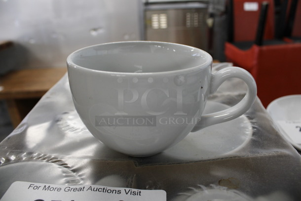 12 BRAND NEW! White Ceramic Mugs. 5x4x3. 12 Times Your Bid!