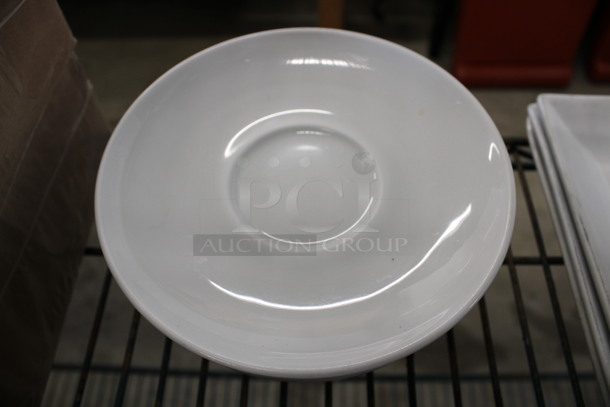 9 White Ceramic Saucers. 6.5x6.5x1. 9 Times Your Bid!