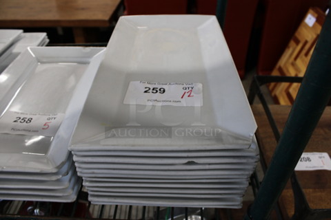 12 White Ceramic Rectangular Plates. 8x15x1. 12 Times Your Bid!