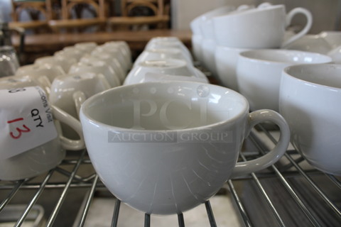 5 White Ceramic Mugs. 5x4x3. 5 Times Your Bid!