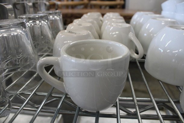 13 White Ceramic Mugs. 3.5x2.5x2.5. 13 Times Your Bid!