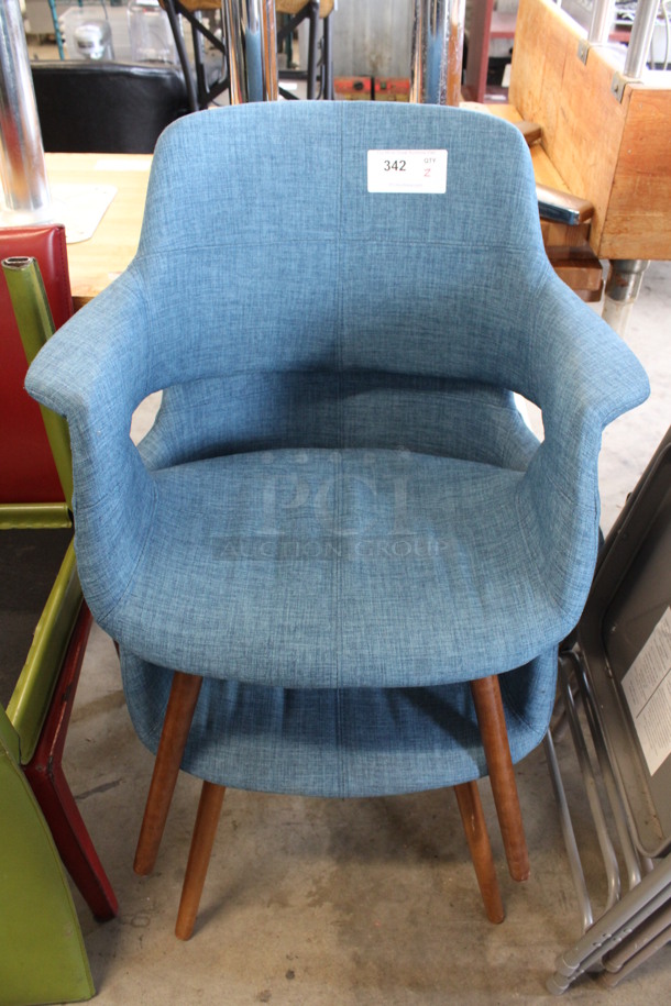 2 Blue Chairs w/ Arm Rests on Wooden Legs. 25x20x33. 2 Times Your Bid!